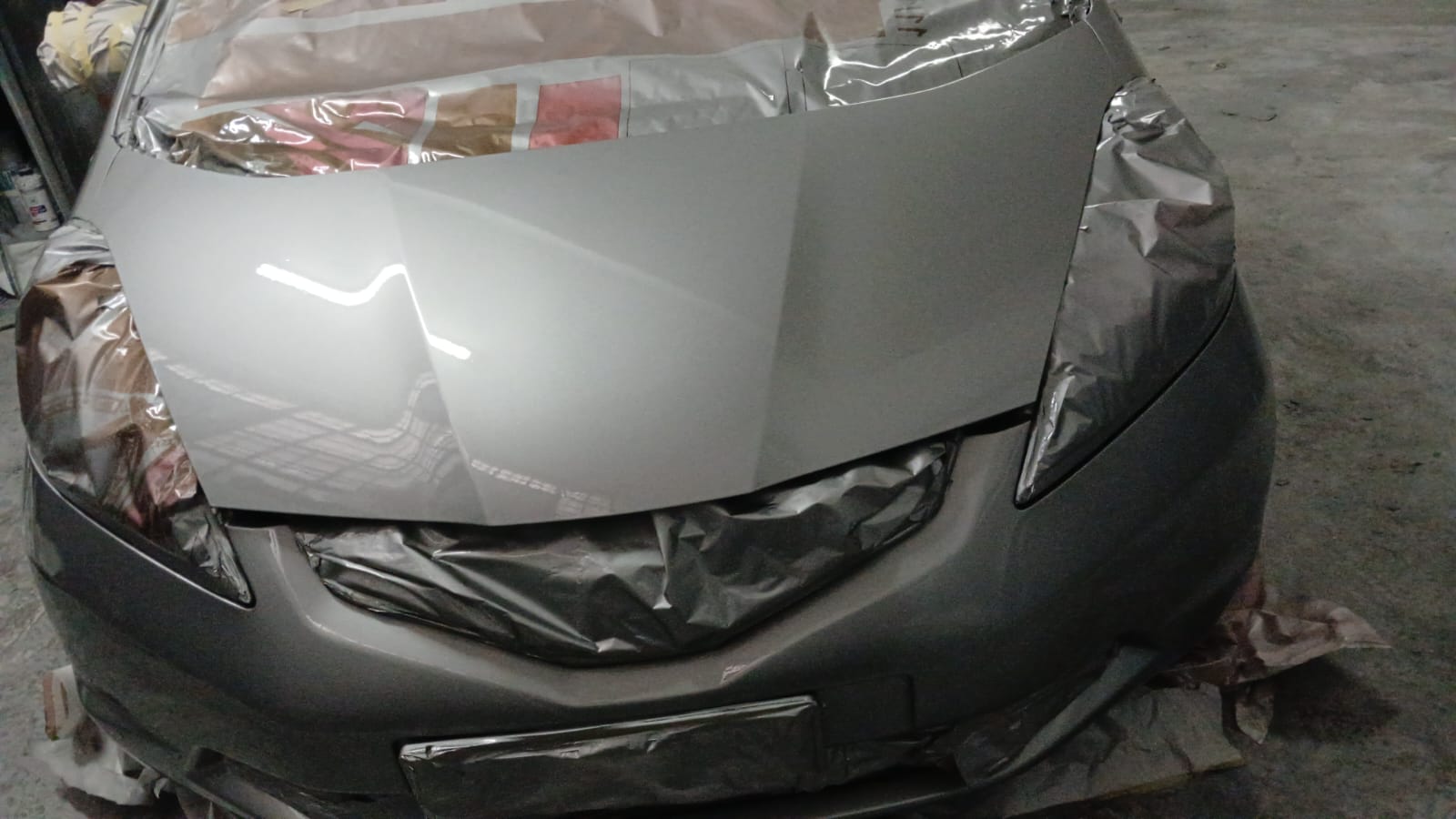 Honda Jazz silver bonnet freshly sprayed at Mega Body Auto Cape Town